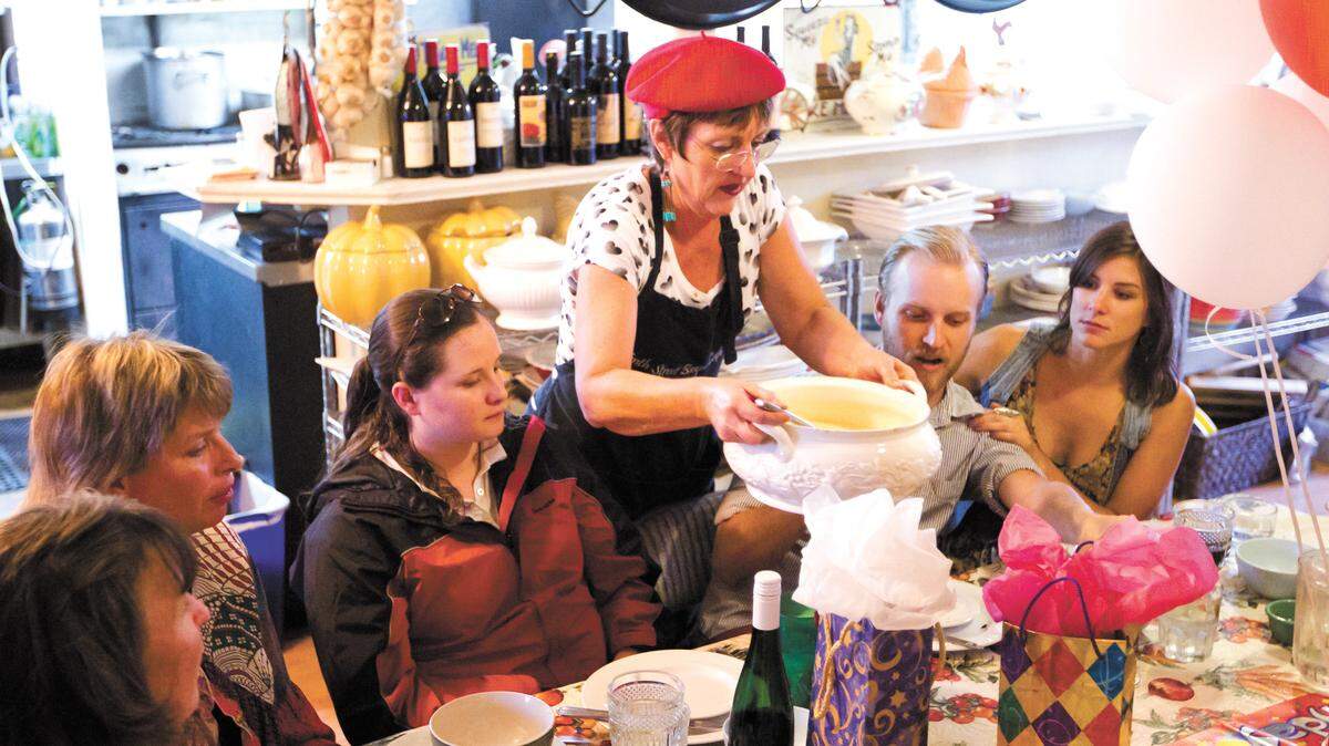 Marti Graff serves a bowl of crooked neck squash soup at the 10th Street Basque Cafe in San Miguel. See more photos »