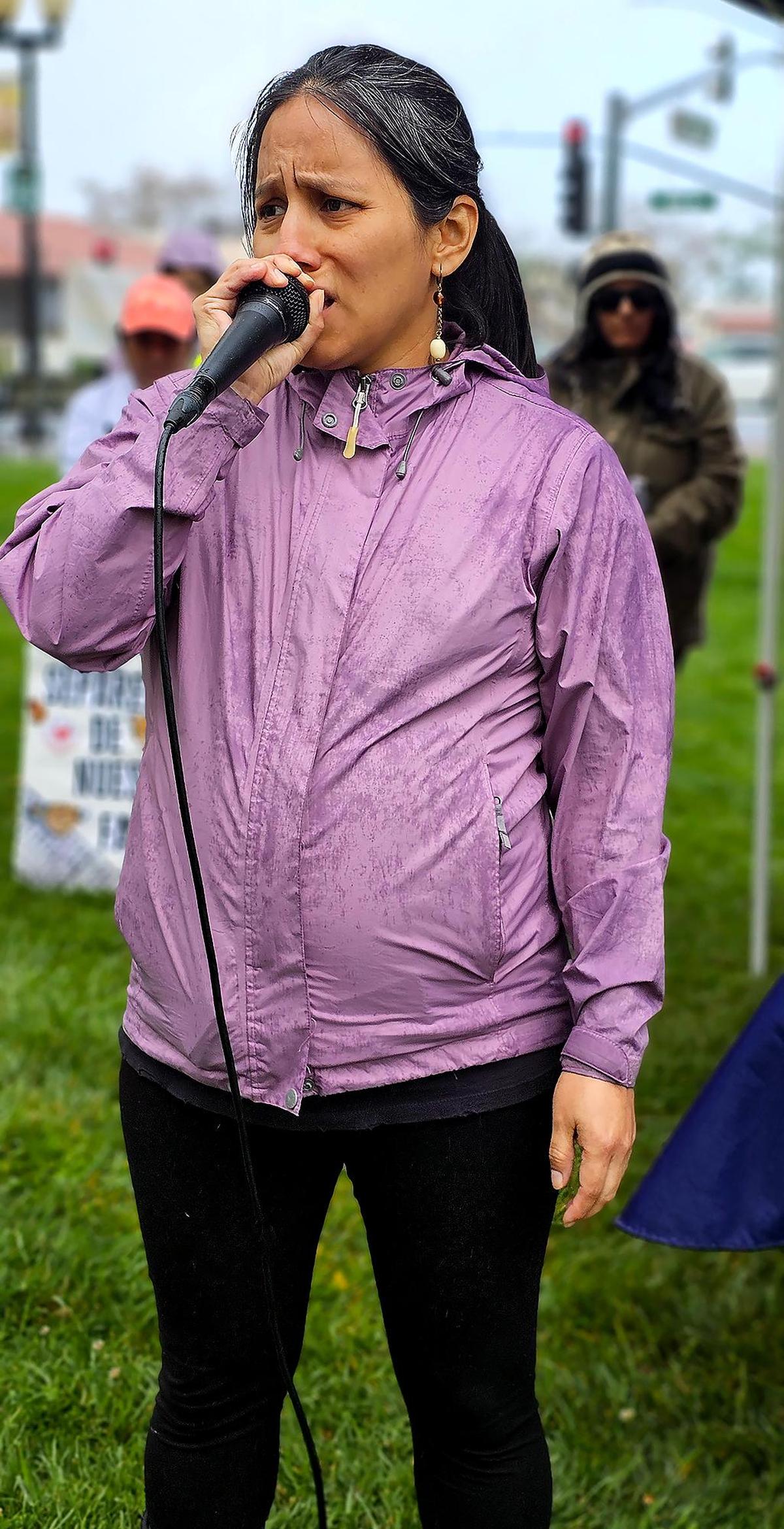 Diversity Coalition of San Luis Obispo’s executive director Rita Casaverde spoke at the protest against deportation and President Donald Trump’s immigration policies on Sunday, March 30, 2025.