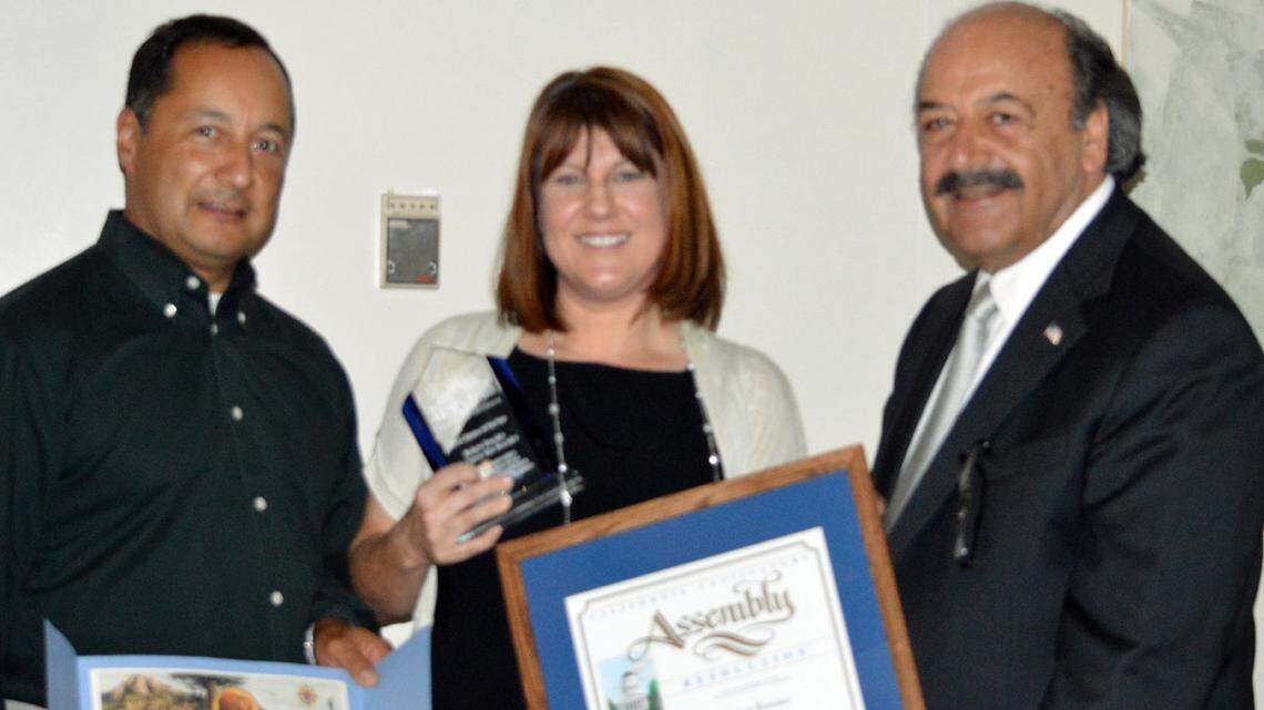 Rob Rosales and Carrie Van Beurden have been named the Templeton Chamber of Commerce's Citizens of the Year. With them is state Assemblyman Katcho Achadjian, R-San Luis Obispo.