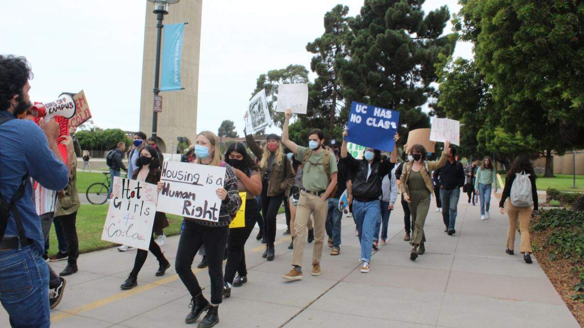 UC Santa Barbara students march from Stroke Tower to Cheadle Hall to demand that the university address its housing shortfall.
