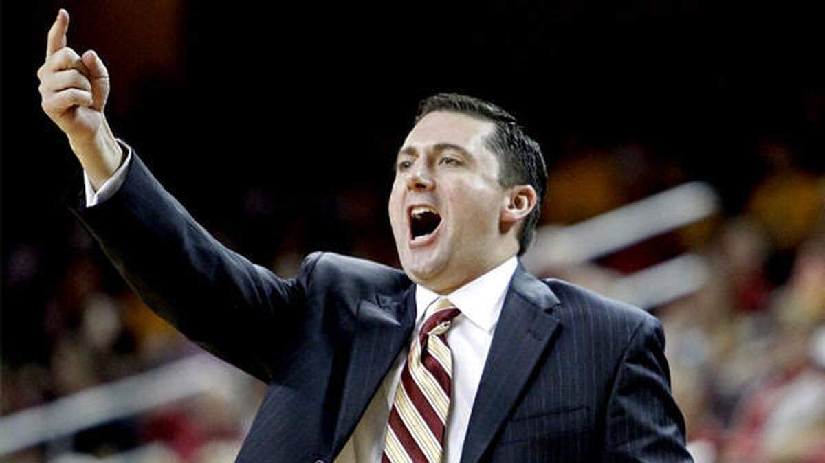 Prior to buying Marv’s Pizza and Sports Bar in Paso Robles, Bob Cantu served as the interim head basketball coach at USC.
