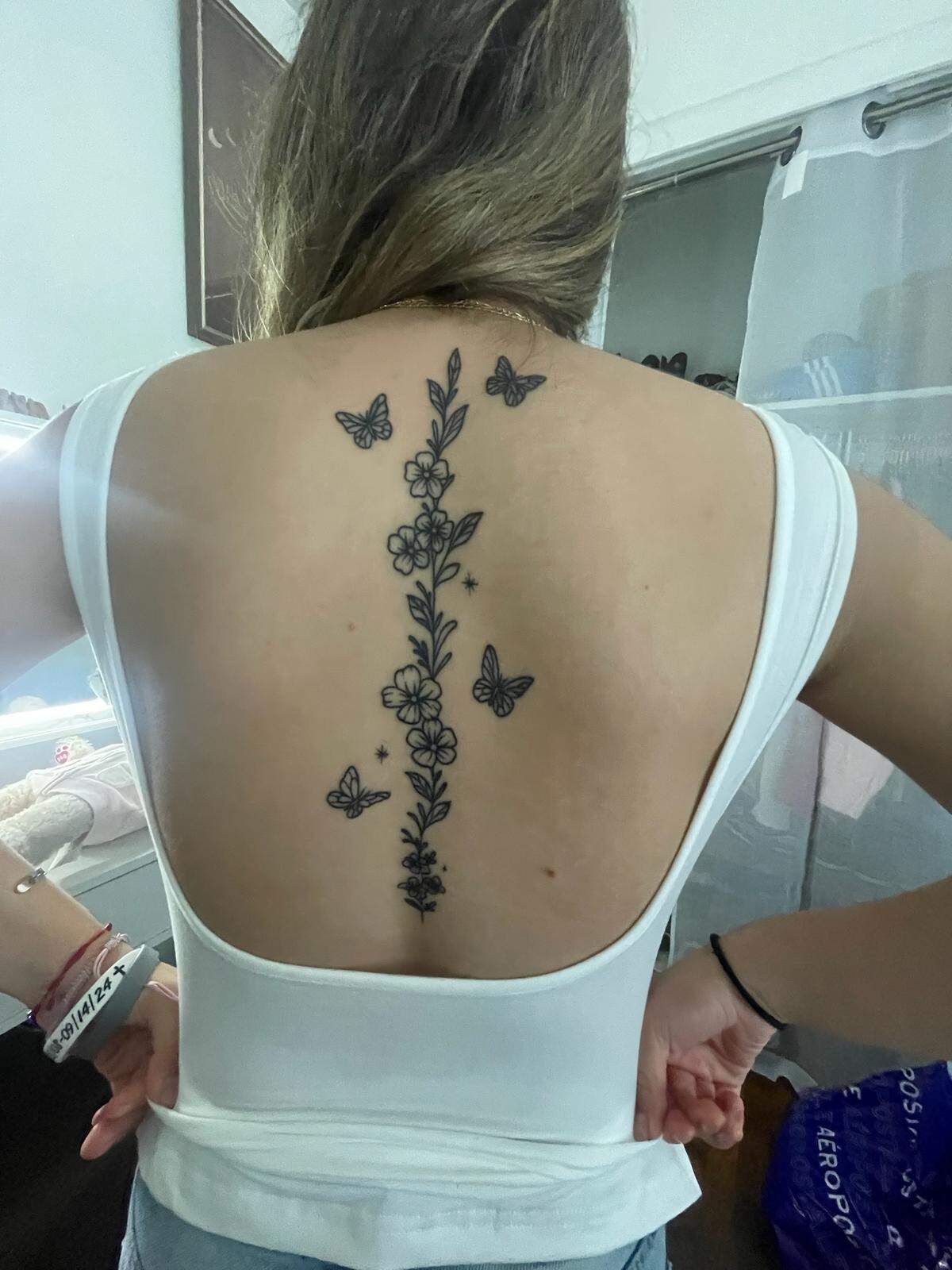 Tattoo artist Carlton Rodgers, owner of Cambria’s 3Left Studio, created this flower and butterfly body art.