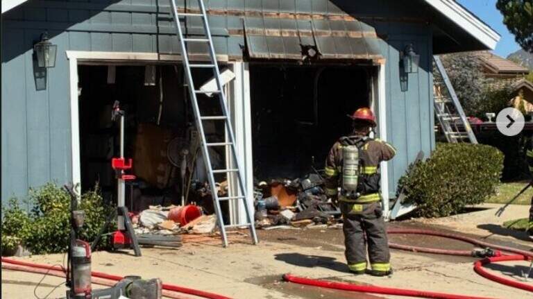 SLO roads temporarily closed as firefighters battle garage fire