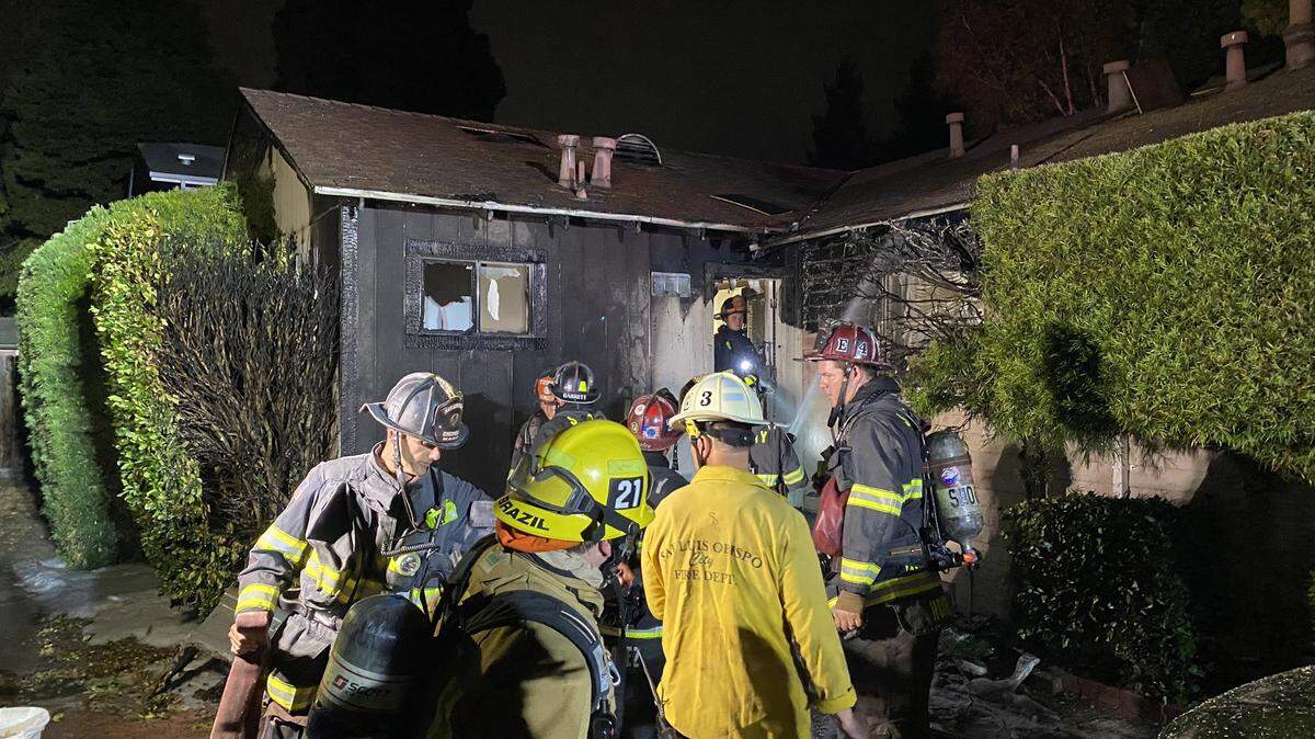 Firefighters respond to a house fire on Buchon Street in San Luis Obispo on Tuesday, Sept. 13, 2022.