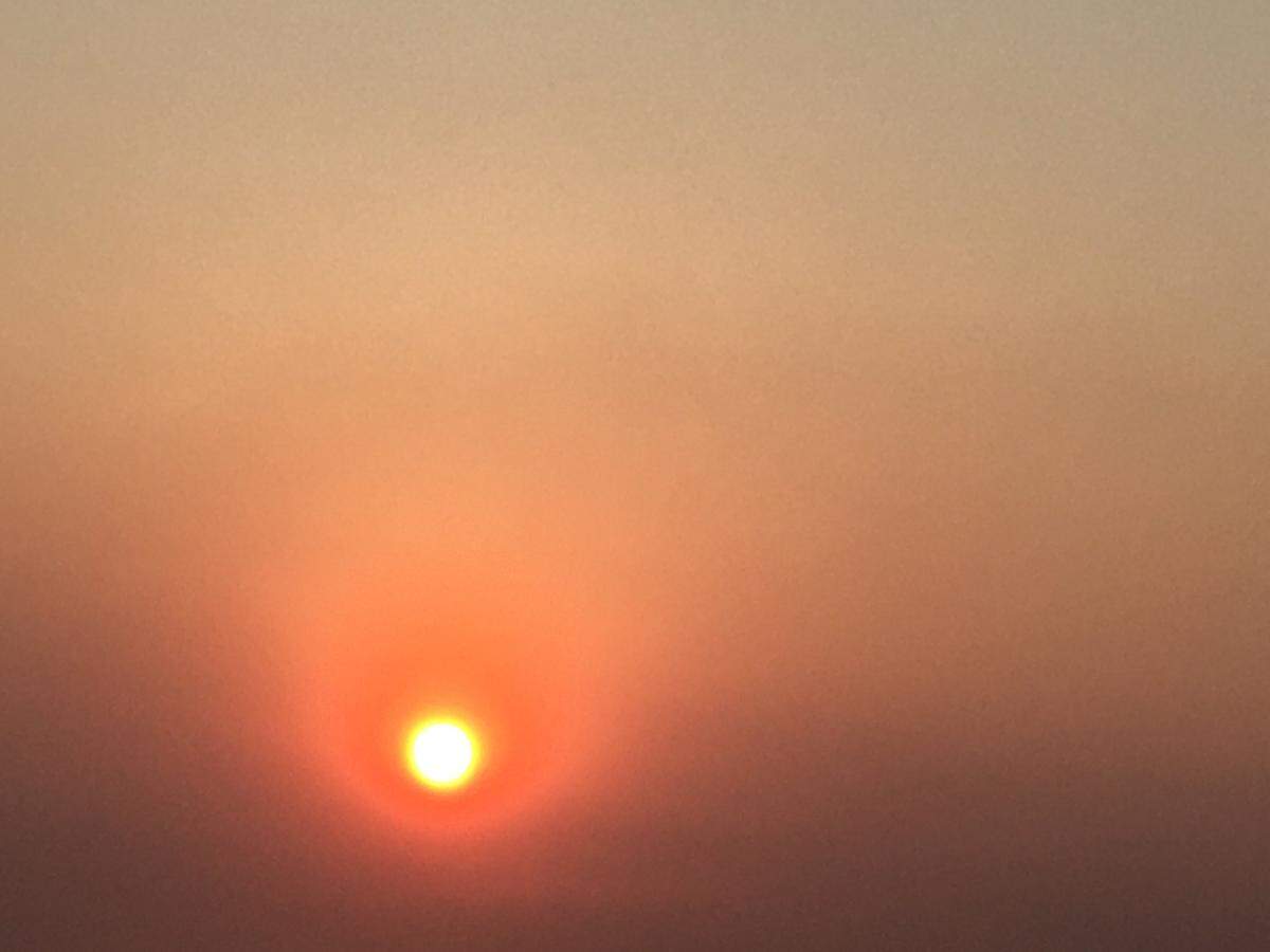 A fiery sun in the sky as smoke from California wildfires spreads to SLO County on Wednesday, Aug. 19, 2020.