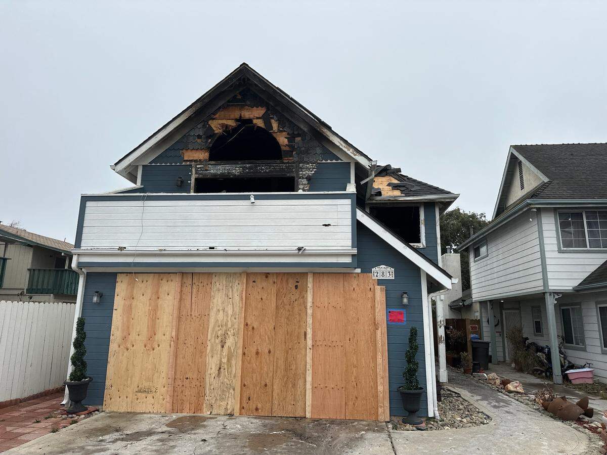 One person died and another was arrested after emergency crews responded to what police believed was an intentionally-set house fire in Arroyo Grande on Oct. 14, 2024. This photo, taken Oct. 15, 2024, shows the damage to the home and the balcony the suspect allegedly went out on multiple times.