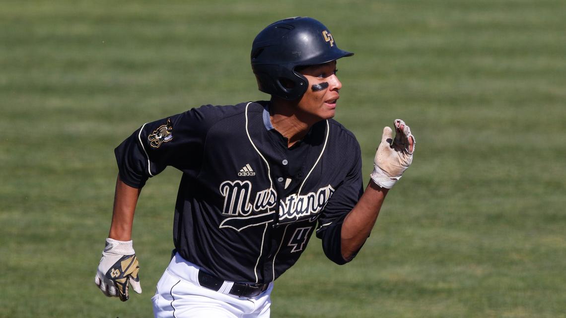 Cal Poly’s Elijah Green runs to second on a double Sunday against Cal, the final game of a non-conference weekend series.