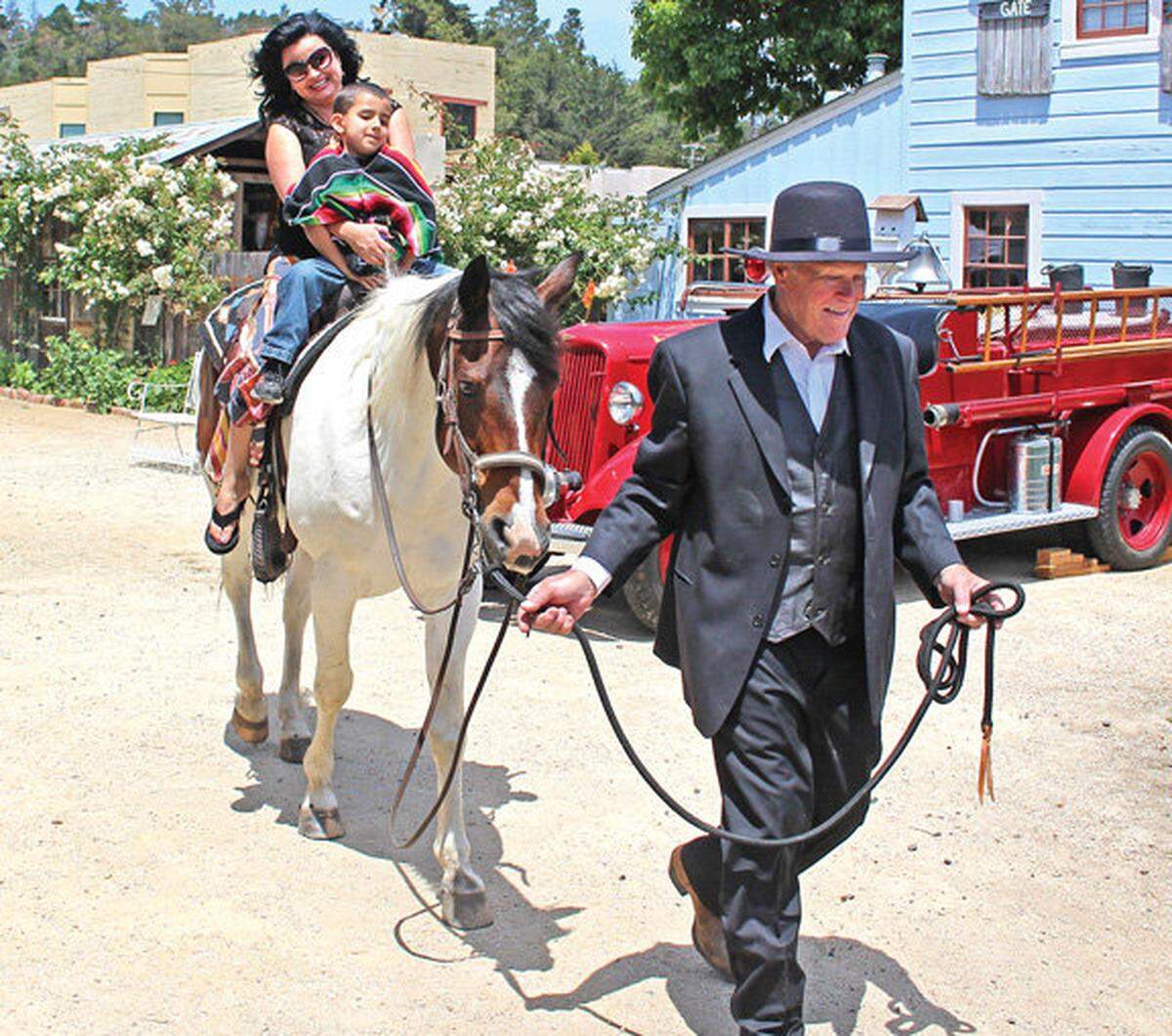 Youngsters enjoy horseback rides during the annual Heritage Day celebration at the Cambria Historical Society’s Cambria Historical Museum on Saturday, May 24, 2014, at the corner of Burton Drive and Center Street.