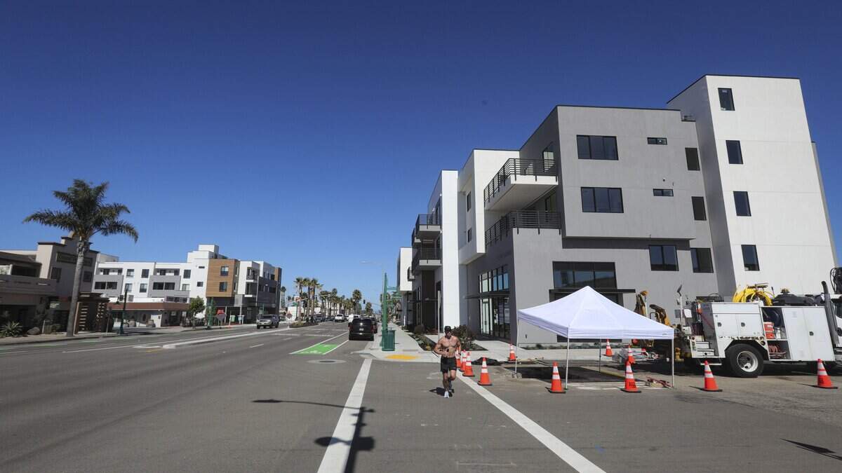 New four-story apartment complexes overshadow the 400 block of West Grand Avenue in Grover Beach on June 10, 2026.