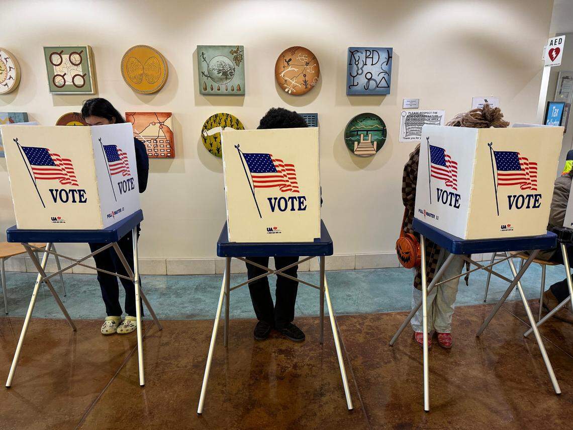 Voters fill out their ballots at the San Luis Obispo County elections office on Nov. 5, 2024.