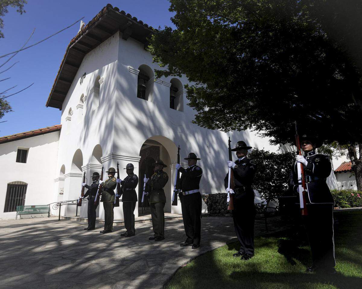 Rifle team stands at attention in front of the San Luis Obispo Mission. The county’s annual Peace Officers’ Memorial ceremony was held this year at Mission Plaza on May 7, 2026.