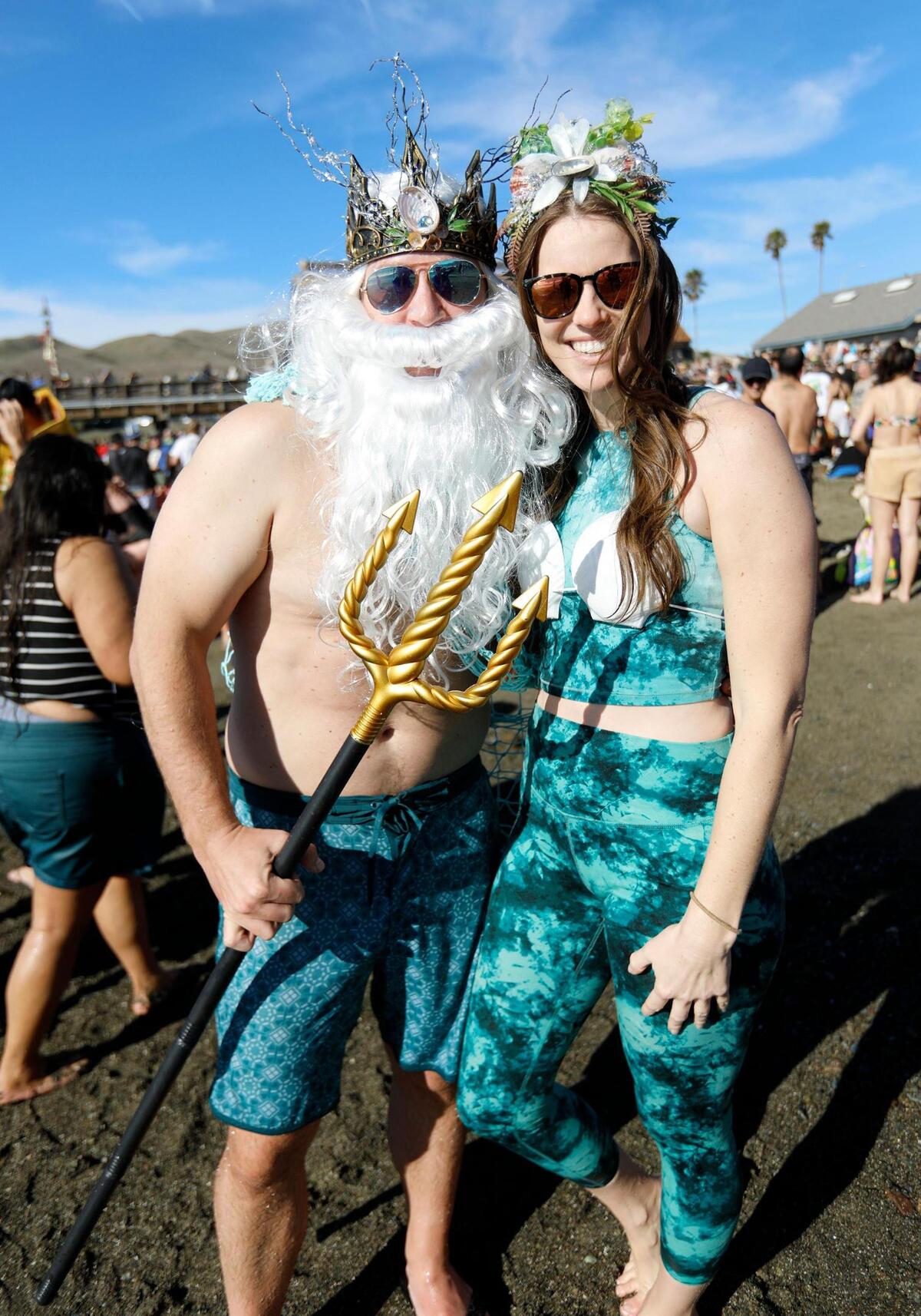 Hundreds of brave participants braved water temperatures in the low 50s to welcome the new year near Cayucos Pier. Laura and Ben Thowe of Denver, Colorado first time at the Polar Bear Dip. They just got married.