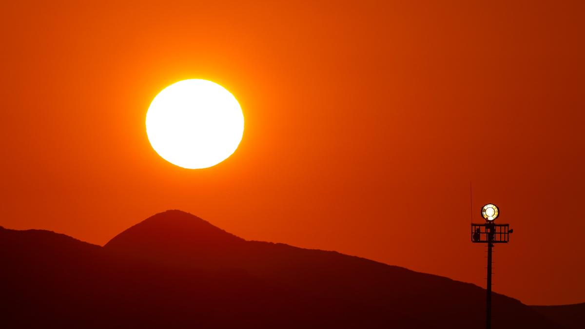 Smoke from California wildfires in August colored the sunset orange over the San Luis Obispo County Regional Airport. At right is the beacon that marks the facility.