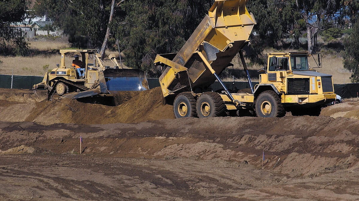 Construction continues at the site of the Los Osos sewer the day after a  recall election appeared to change the majority of the Community Services  District. David Middlecamp 9-28-05