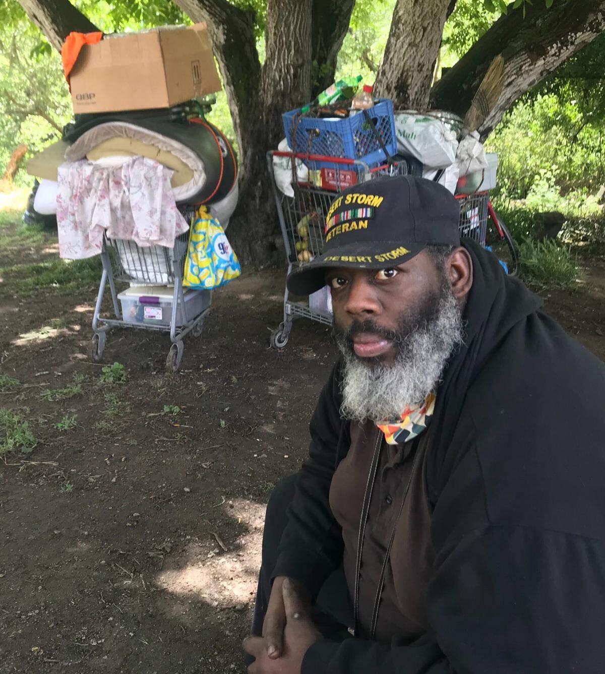 John Jefferson, 47, was forced to sort through his belongings after San Luis Obispo officials came to clear out the encampment where is lived along San Luis Creek on the Bob Jones Trail.