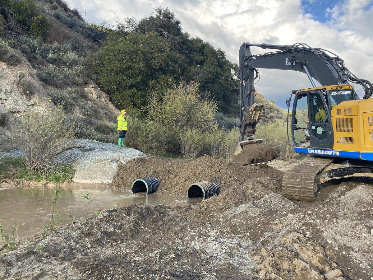 Heavy equipment was brought in to help contain and clean up a spill of 4,533 gallons of crude oil after a tanker truck overturned and crashed into the Cuyama River in March 2020.