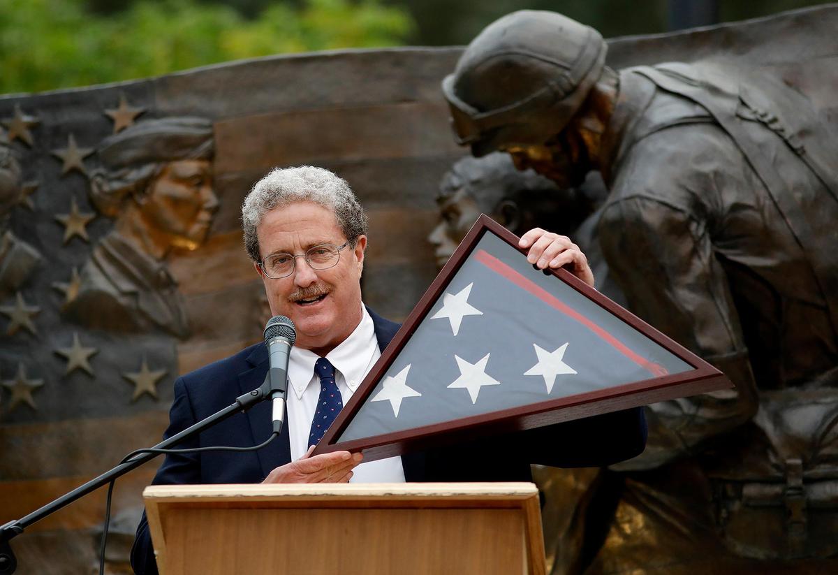 A commemorative rally was hosted by the North County Tea Party in Atascadero remembering 9/11. The rally is titled “Unify America -- We are Stronger Together.” Andy Caldwell, a local candidate for congress, was one of the speakers.