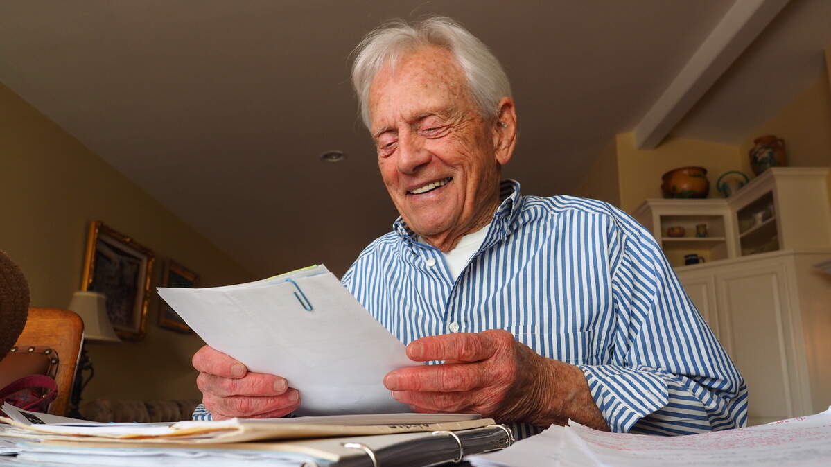 Wayne Smith reviews Joslyn Adult Recreation Center files.