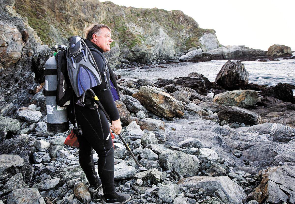 Drew Arnold takes in the view of his “office” as he gets ready for a day of diving for jade in Big Sur. Photo by Joe Johnston 01-19-12