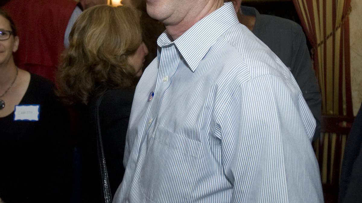 Dan Dow celebrates at Cafe Roma on Tuesday night.