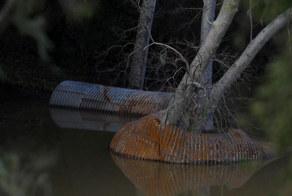 Culvert pipes are seen floating in the Salinas River on Saturday, March 11, 2023, after Chimney Rock Road northwest of Paso Robles washed out during a recent rain storm.