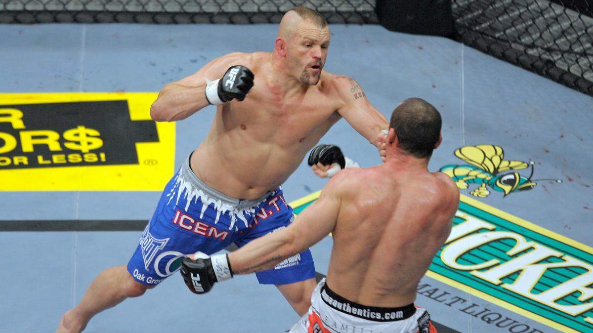 Chuck Liddell, left, throws a punch against Wanderlei Silva, of Brazil, during their light heavyweight bout at UFC 79 at the Mandalay Bay hotel and casino in Las Vegas on Saturday, Dec. 29, 2007.