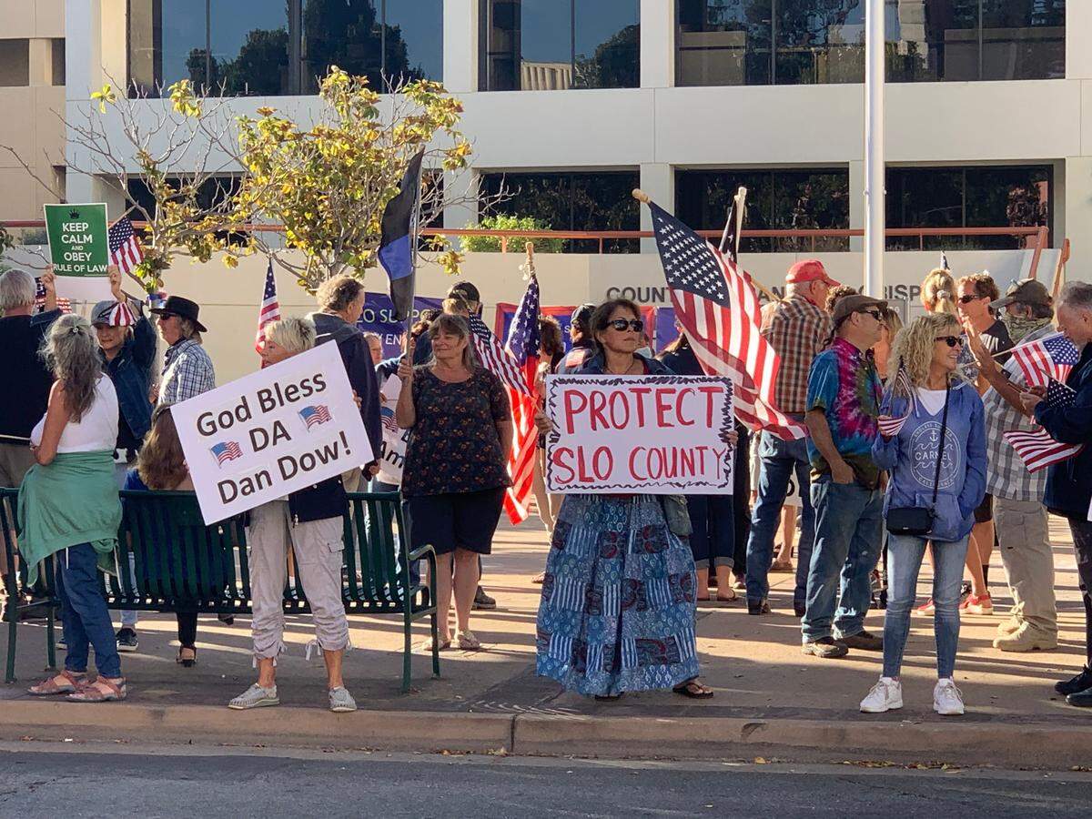 Protesters rally on Monterey Street in San Luis Obispo in support of District Attorney Dan Dow and Central Coast law enforcement agencies on Aug. 27, 2020.