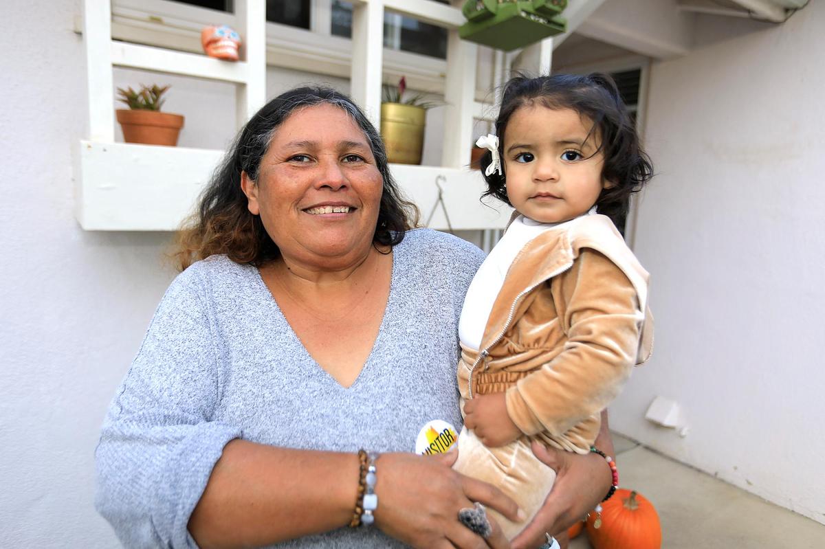 Barbara Rodriguez, here in front of her Orcutt home holding her granddaughter Lillian, age 1, is currently fostering four teenage boys from San Luis Obispo County. A lack of foster homes has the Department of Social Services looking for parents who can take in children and teenagers.