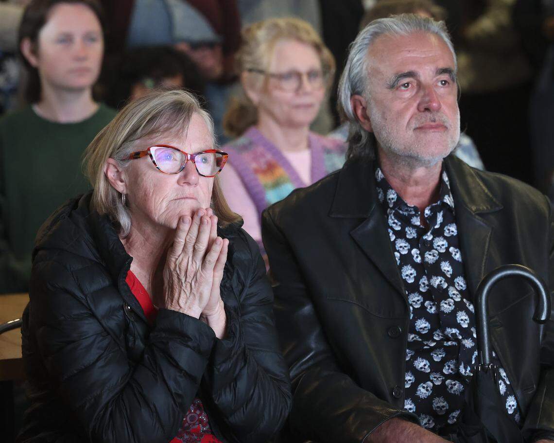 India D'Avignon, left, professsor emeritus with the music department, registered a range of emotions as she sat with Ignatios Vakalis, former chair of the Computer Science Department. An audience of about 300 witnessed the splashown of the Artimis II mission around the moon April 10, 2026 at Cal Poly's University Union.