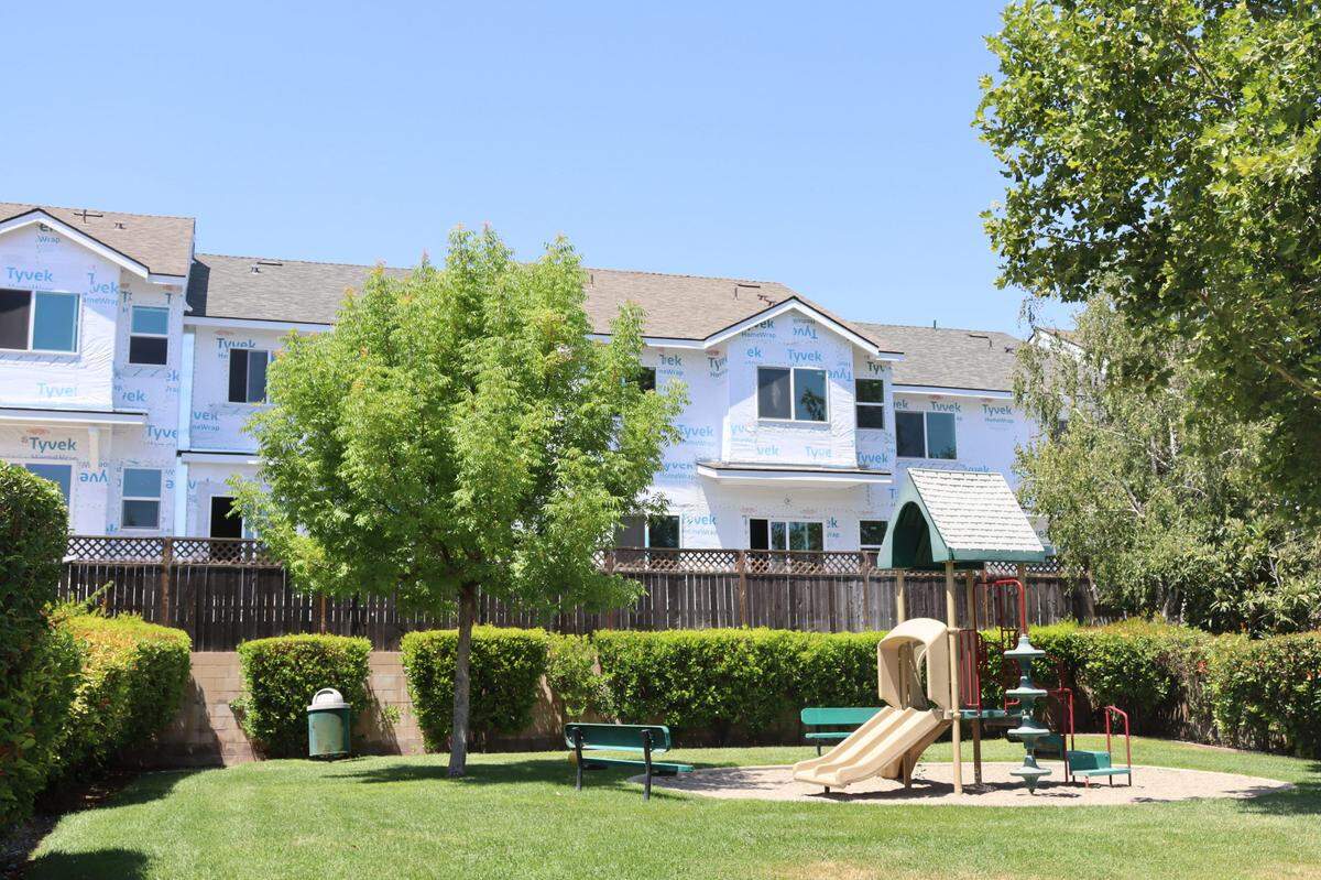 A 70-unit housing development at 10850 El Camino Real in Atascadero has led to disputes with neighbors over slow progress. Unfinished buildings can be seen from neighboring La Costa Court in Atascadero.