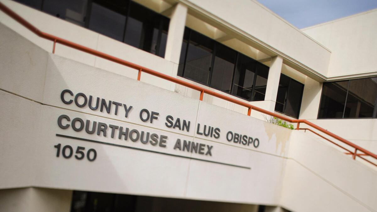 The front entrance and sign at the San Luis Obispo Courthouse.