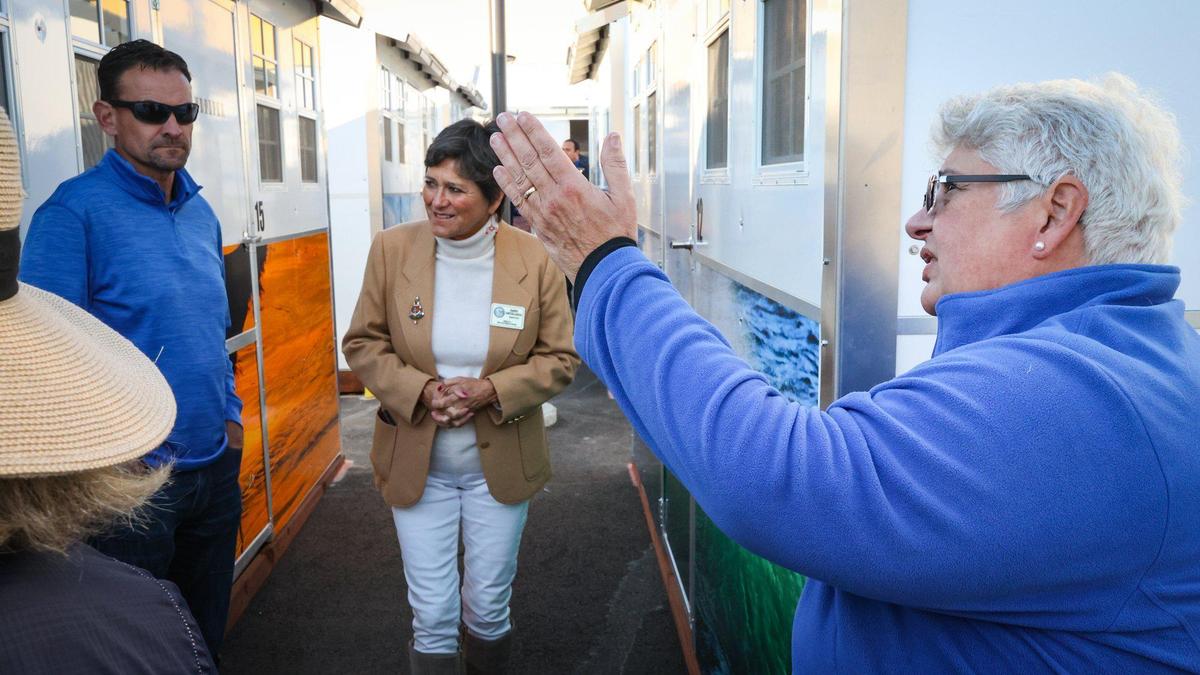 Supervisor Dawn Ortiz-Legg, center, was an early supporter of the Cabins for Change project in Grover Beach, and Janna Nichols, right, is executive director of 5Cities Homeless Coalition. The South County transitional housing project features 20 100-square-foot pallet shelters.