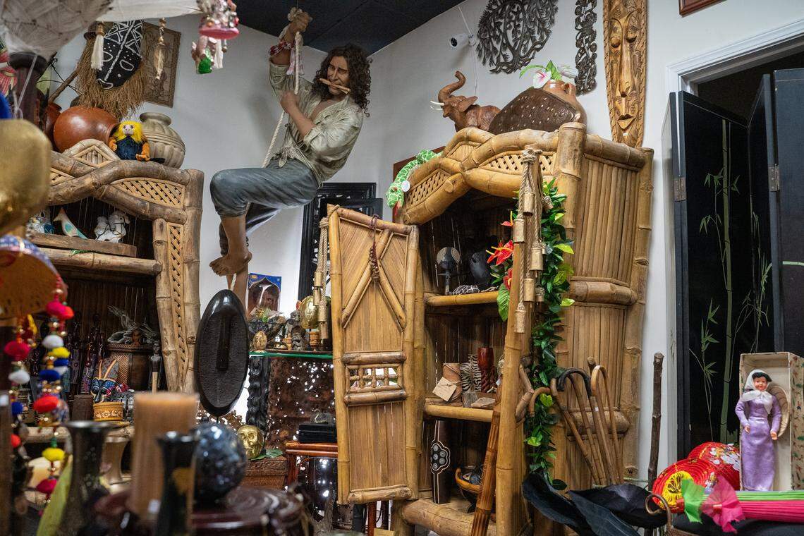 Furniture from Disneyland displays antiques at Odd Fellows Antiques Emporium on A room themed around Alice in Wonderland and dark gothic antiques is part of the new home of Odd Fellows Antiques Emporium in Grover Beach, pictured here on Tuesday, Nov. 11, 2025. The antique store moved to 1527 W Grand Ave. in August after its 983 W Grand Ave. home was sold to new owners.