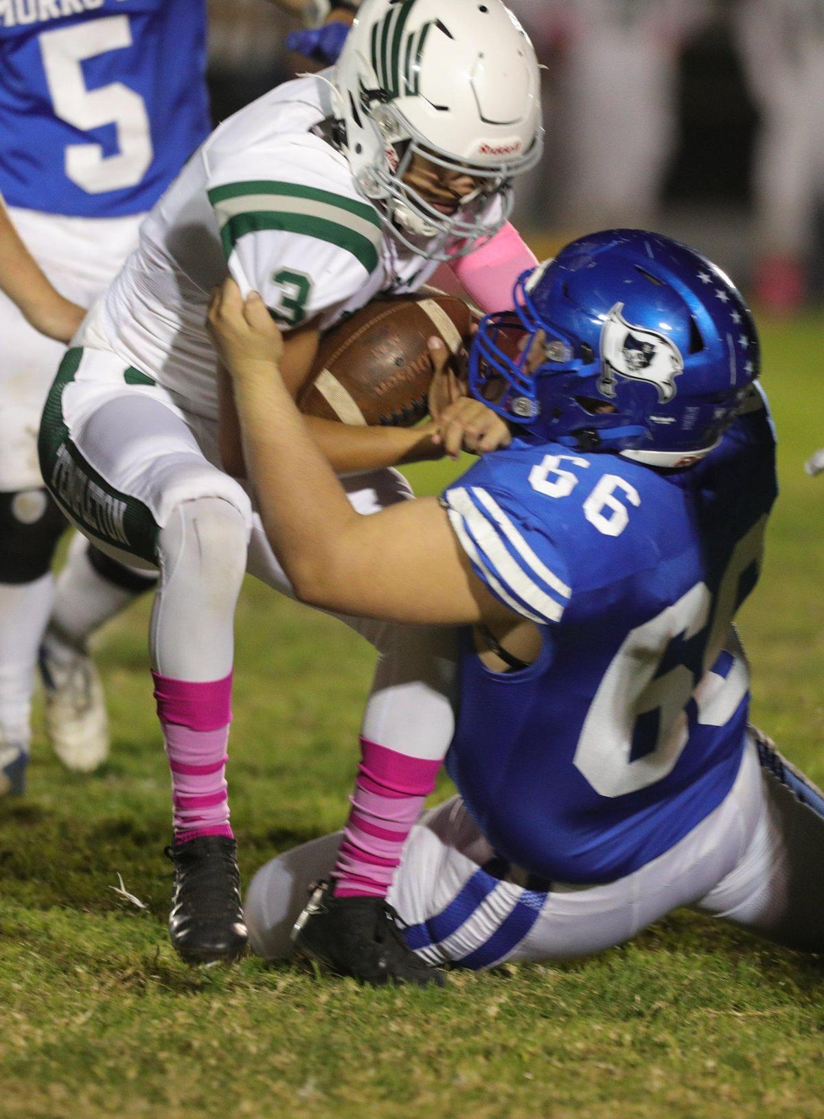 Ben Peterson sacks Anthony Chavez. Templeton beat Morro Bay 27-9 in an Ocean League football game on Oct. 21, 2022.
