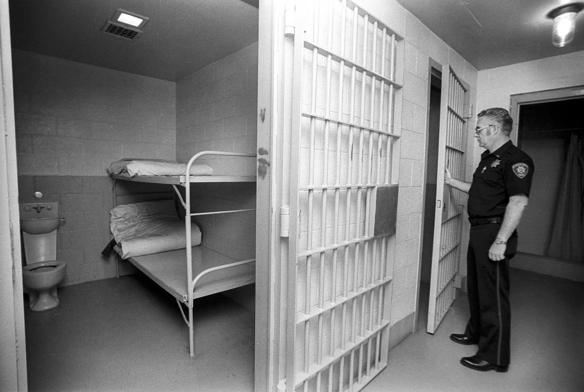 Paso Robles police Lt. Ed Bryant checks an empty cell at Paso Robles City Jail in April 1982.