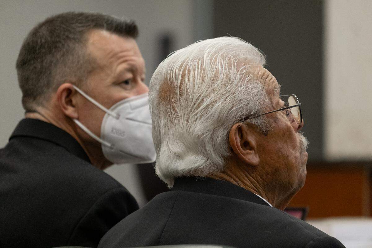 Paul Ruben, left, and Ruben Flores await court proceedings to begin in the Kristin Smart murder trial on Tuesday, July 26, 2022, in Monterey County Superior Court in Salinas.