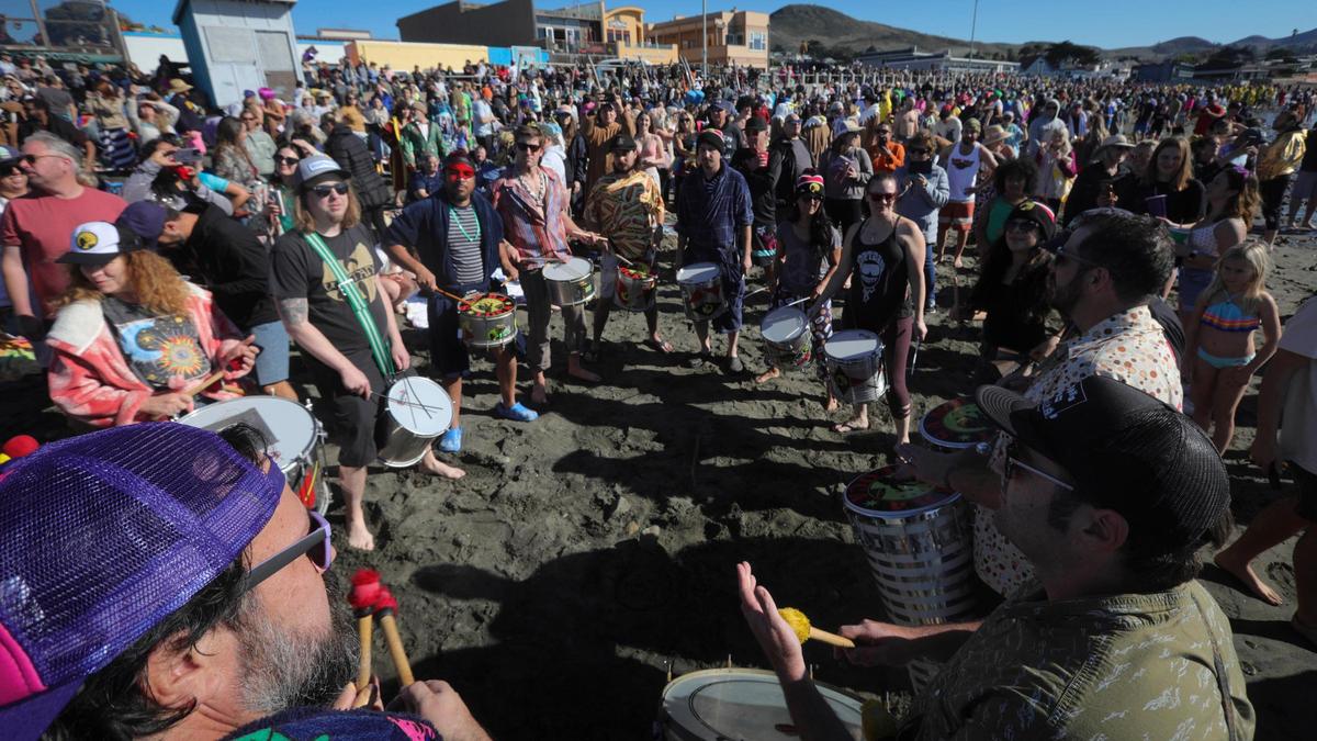 Samba Loca began a drum circle a few minutes before the noon plunge. About 1,000 people celebrated the New Year plunging into the surf at Cayucos at the 44th annual Carlin Soulé Memorial Polar Bear Dip on Jan. 1, 2024.