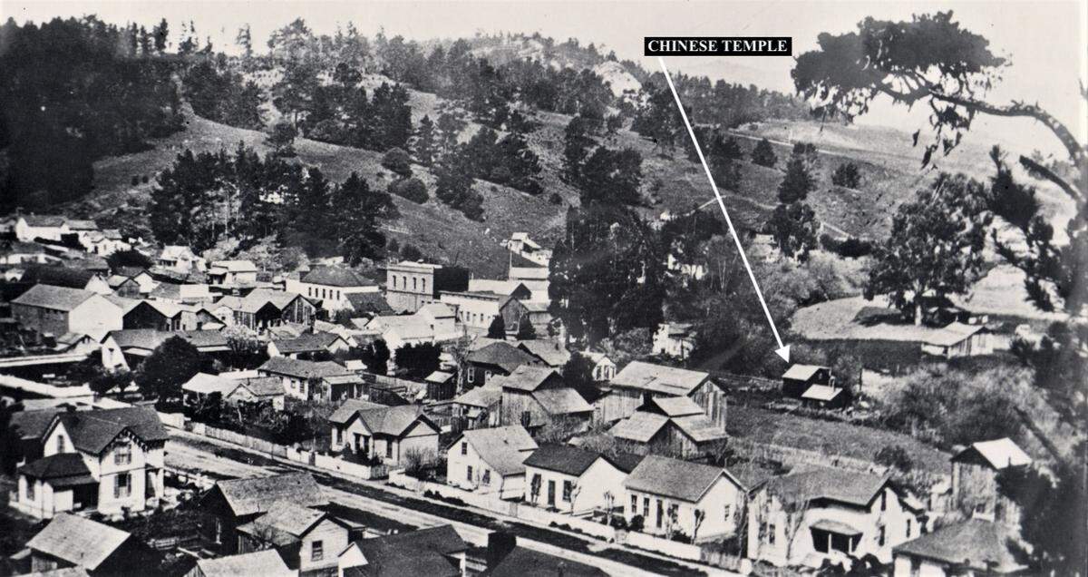 This photo from the archives of the History Center of San Luis Obispo County, which is facing northeast, shows downtown Cambria in the 1880s. The red arrow points to the Chinese Temple, which was facing Santa Rosa Creek.
