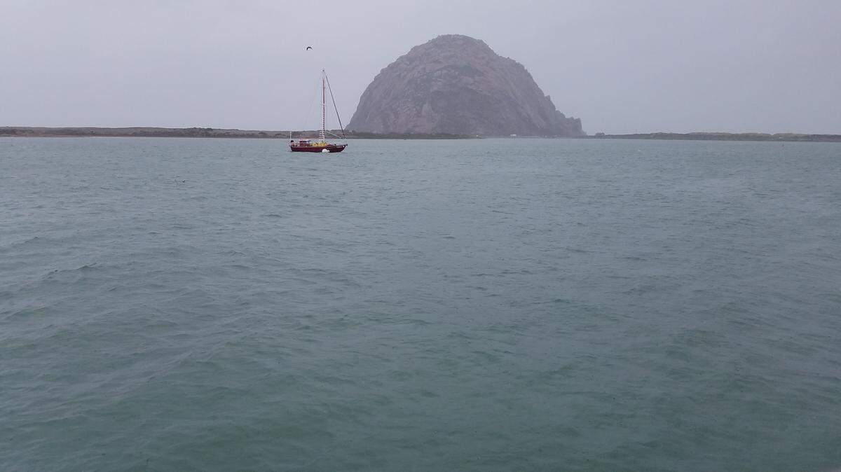 A lone moored sailboat endures the high winds in Morro Bay Harbor at as a major winter storm hit San Luis Obispo County in January 2021. A La Niña forecast may mean lower-than-normal winter rainfall for the Central Coast.