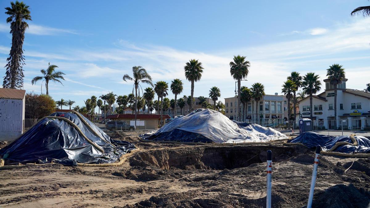 Construction work on a new mixed-use condominium and commercial space development at the former site of B.J.’s ATV Rentals at 197 West Grand Ave. in Grover Beach unearthed an oily substance that residents nearby could smell, pictured Tuesday, Dec. 31, 2024. Grover Beach community development director Megan Martin said the contaminated soil was expected in the building process, and will be removed by Friday, Jan. 10, 2025.