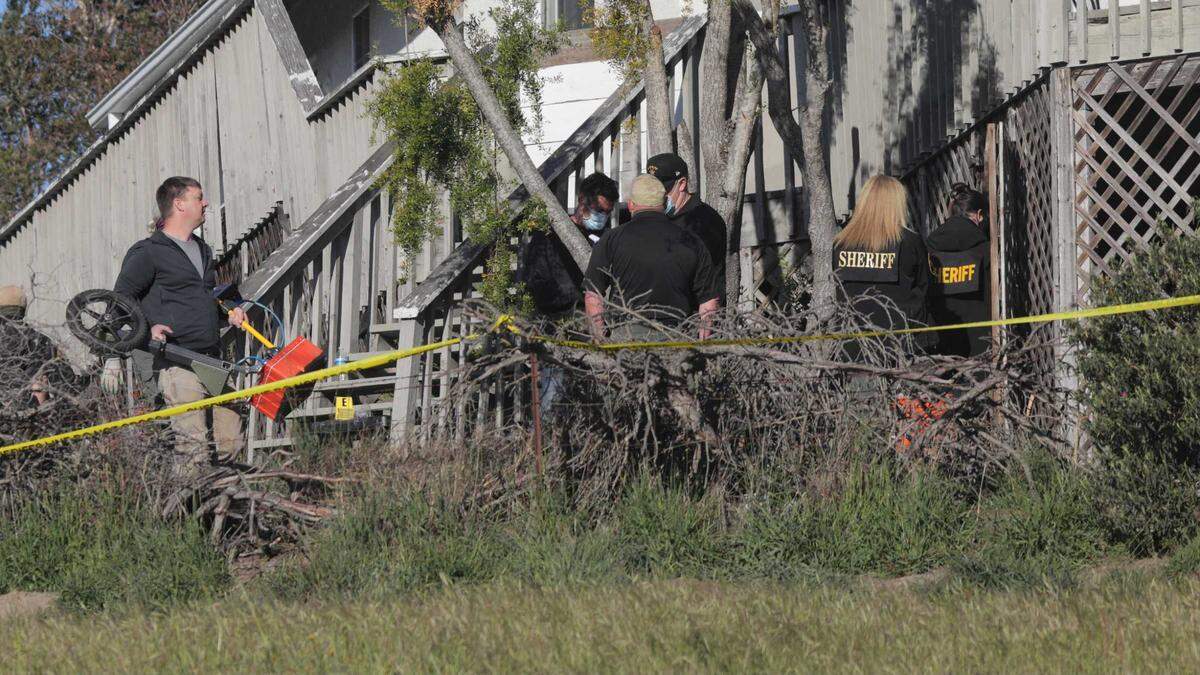 Investigators with the San Luis Obispo County Sheriff’s Office search under the Arroyo Grande home of Ruben Flores on Tuesday, March 16, 2021. Flores is the father of Paul Flores, now considered the prime suspect in missing Cal Poly student Kristin Smart’s disappearance.