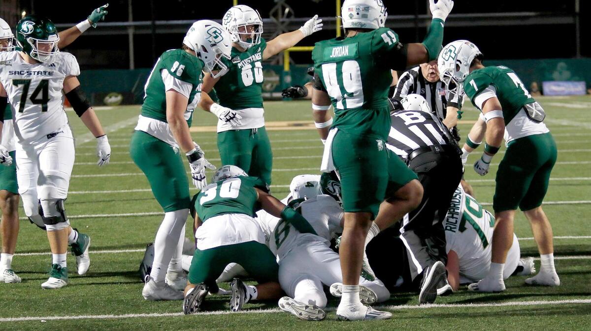 Sacramento State fumbles the ball Saturday at the 1-yard line and Cal Poly takes possession with one minute left in the game.