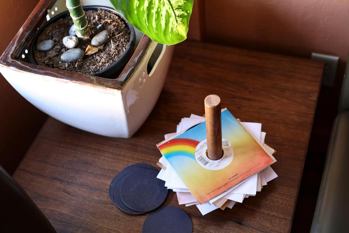 A stack of 45s sits on a table at vinyl bar Jan’s Place in San Luis Obispo on March 13, 2024.