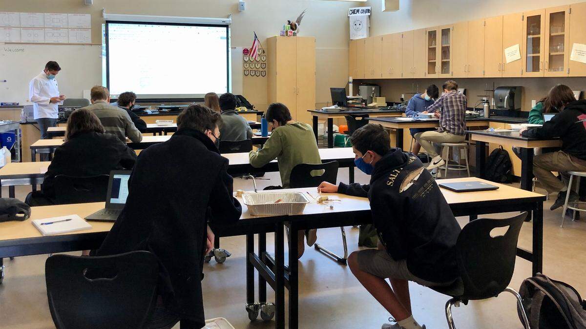 Students at Atascadero High School work on chemistry together in Jon Conrad’s class on March 8, 2021. Atascadero Unified School District is the first district in San Luis Obispo County, California, to bring middle and high school students back to in-person learning since the COVID-19 pandemic shut down campuses in March 2020.
