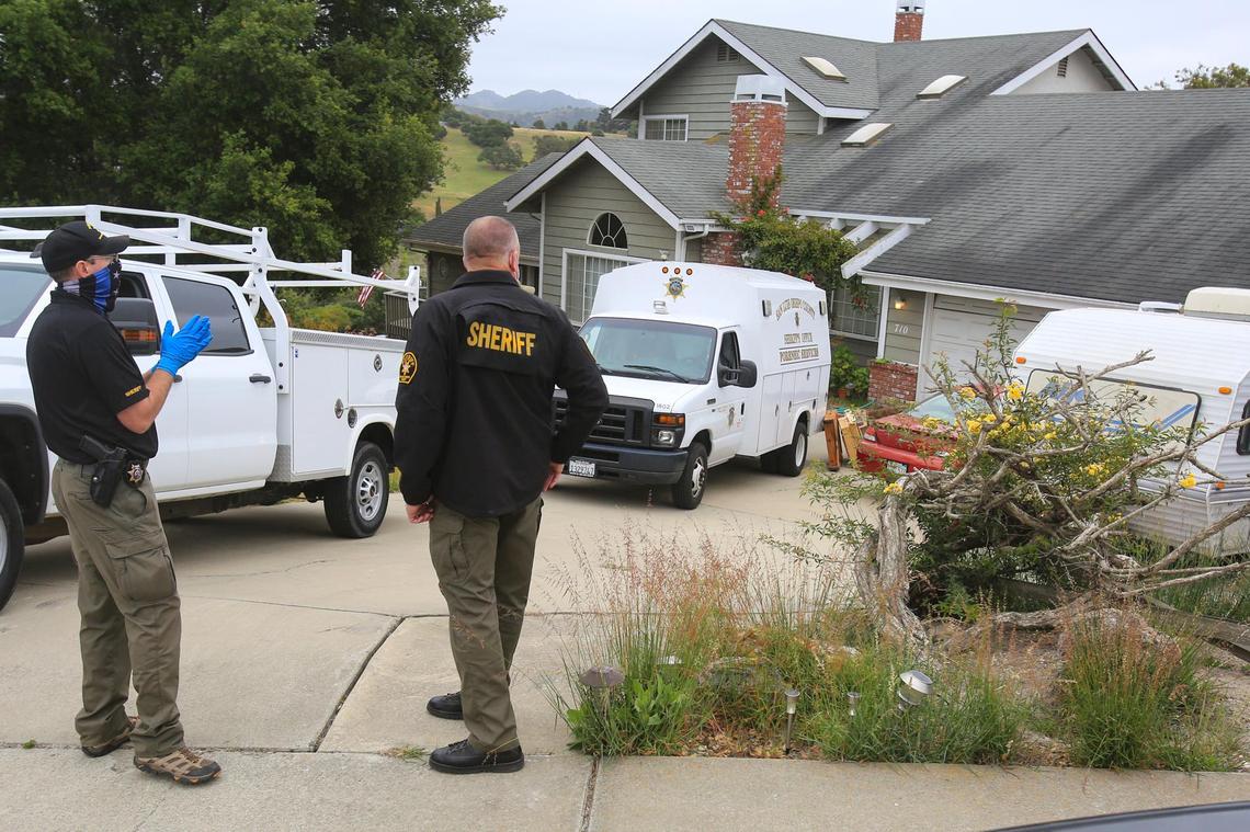 Investigators with the San Luis Obispo County Sheriff’s Office stand outside the Arroyo Grande home of Ruben Flores on Tuesday, April 13, 2021. Ruben Flores and his son, Paul Flores, were arrested in the disappearance of Cal Poly student Kristin Smart in 1996. Paul Flores was arrested on suspicion of murder. Investigators were executing a new search warrant at the home.