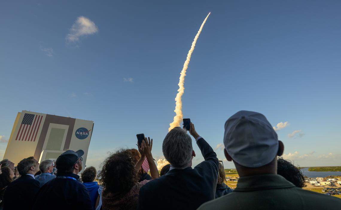 Guests watch the launch of NASA’s Space Launch System rocket carrying the Orion spacecraft with NASA astronauts Reid Wiseman, commander; Victor Glover, pilot; Christina Koch, mission specialist; and CSA (Canadian Space Agency) astronaut Jeremy Hansen, mission specialist on NASA’s Artemis II mission,, Wednesday, April 1, 2026, from Operations and Support Building II at NASA’s Kennedy Space Center in Florida.