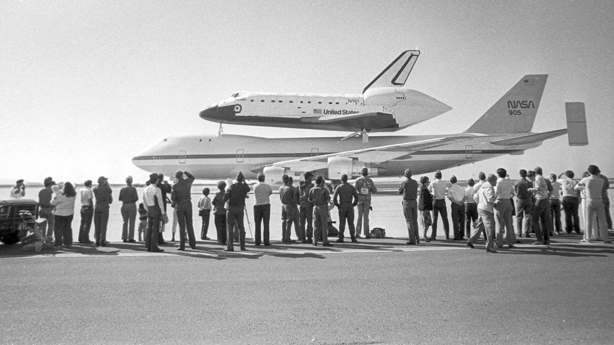 Reporters and photographers line up to watch and photograph the space shuttle and 747. The plane and cargo circled over Santa Maria and Lompoc before landing on time at the base. The brand new space shuttle Discovery visited Vandenberg Air Force Base on Nov. 6, 1983.