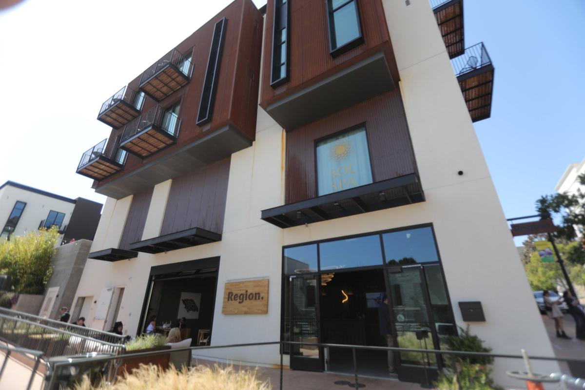John Eide is owner of Region, a wine tasting room that represents over 25 county wineries April 29, 2022. They sell by the sip, half and full glass and have information on the wineries represented.