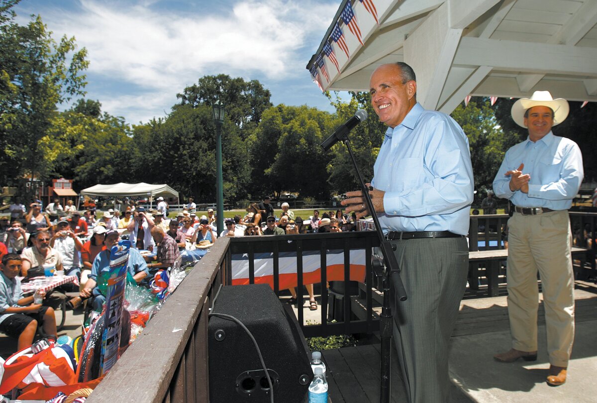 Rudy Giuliani speaks to the crowd during a campaign stop at Santa Margarita Park in June 2007. At right is Sam Blakeslee.