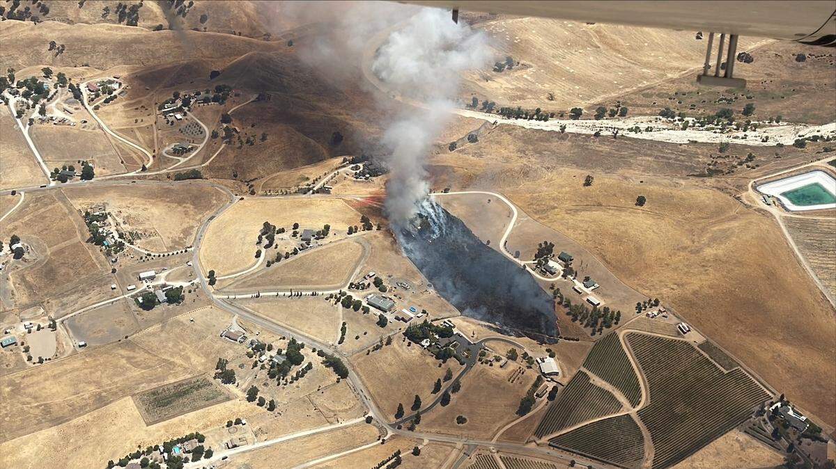 Cal Fire responded to an 11-acre fire in San Miguel on Aug. 20, 2024.